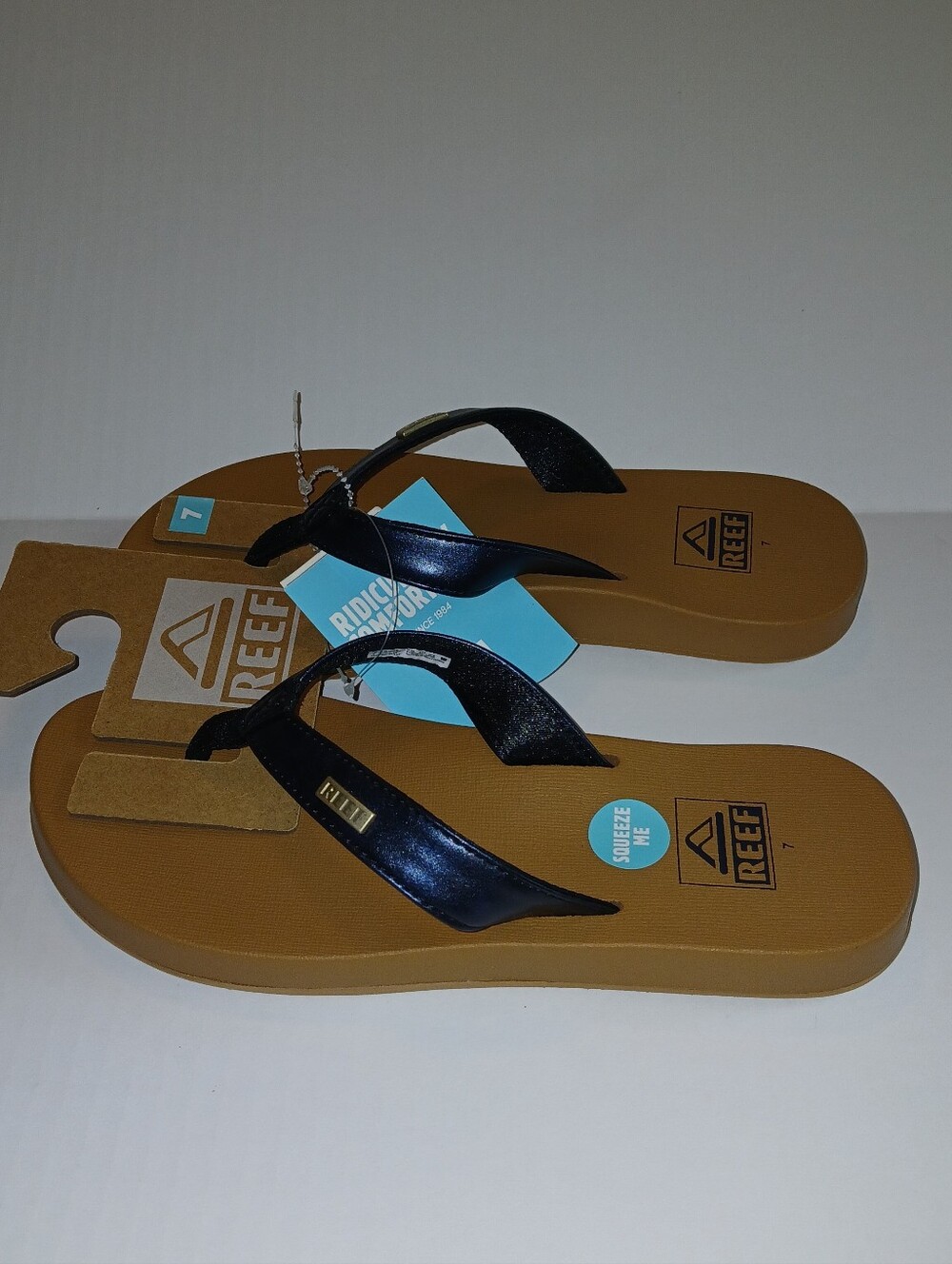 Reef Lightweight Foam Cushion Star Sassy Mia Flip Flops, Black Metallic / Tan
